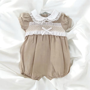 Taupe baby girls smocked romper with bows gillytots children’s boutique 